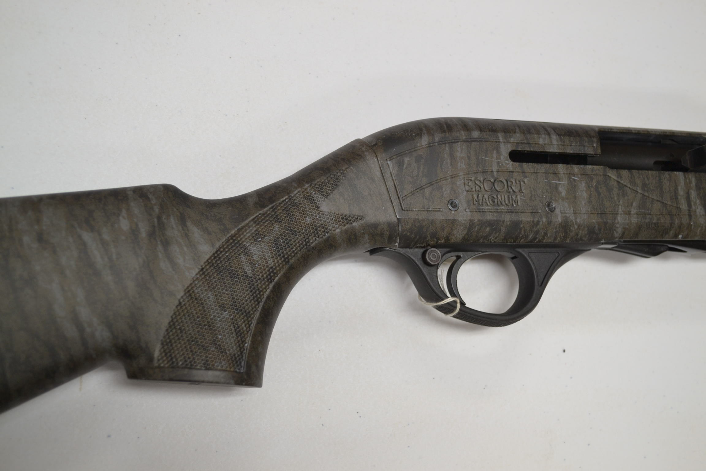 Shotgun with green camo hydro-dip finish