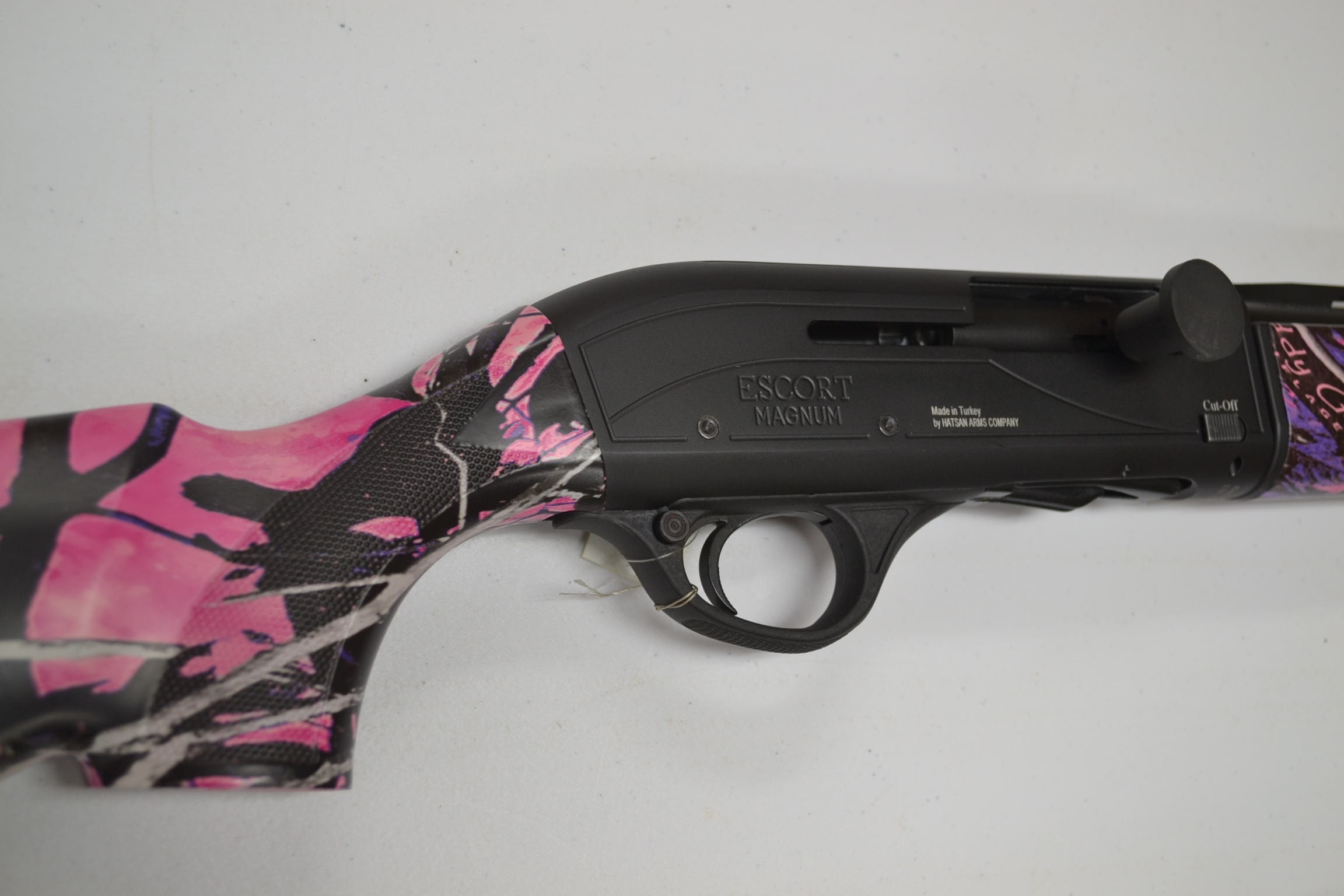 Shotgun with pink camo hydro-dip finish